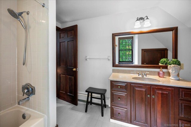 286 Limestone Rd, Ridgefield, CT 06877 - bathroom with vanity, bathtub / shower combination, tile patterned flooring, and a baseboard heating unit