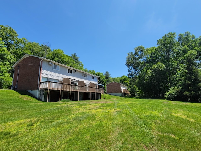 213 Baxter Rd Apt D, Mansfield, CT 06268 - view of grassy yard with a deck