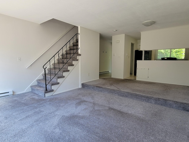 213 Baxter Rd Apt D, Mansfield, CT 06268 - unfurnished living room with stairs, carpet flooring, and a baseboard radiator