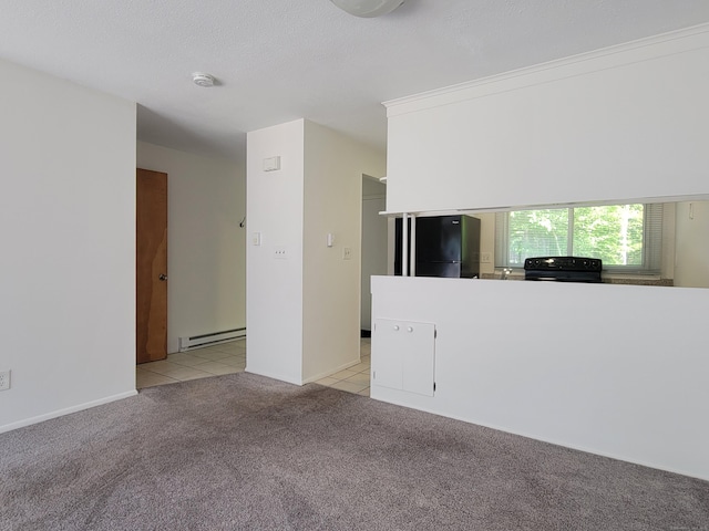 213 Baxter Rd Apt D, Mansfield, CT 06268 - living area featuring a baseboard radiator, light colored carpet, and light tile patterned flooring