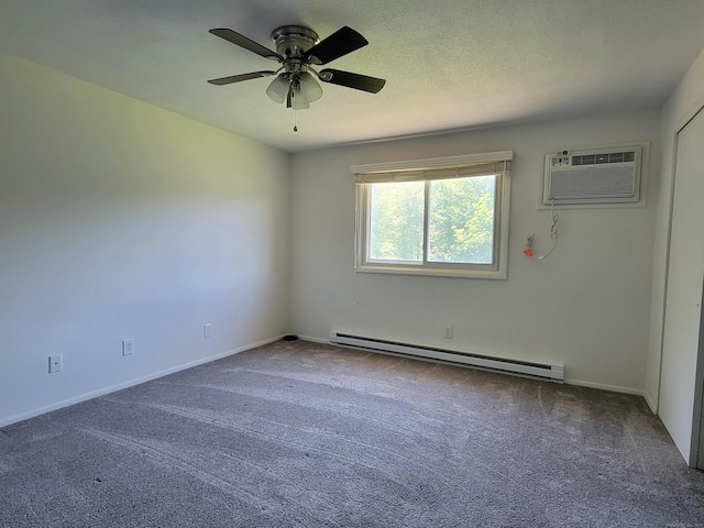 213 Baxter Rd Apt D, Mansfield, CT 06268 - carpeted spare room featuring a baseboard heating unit, a wall unit AC, a ceiling fan, and baseboards