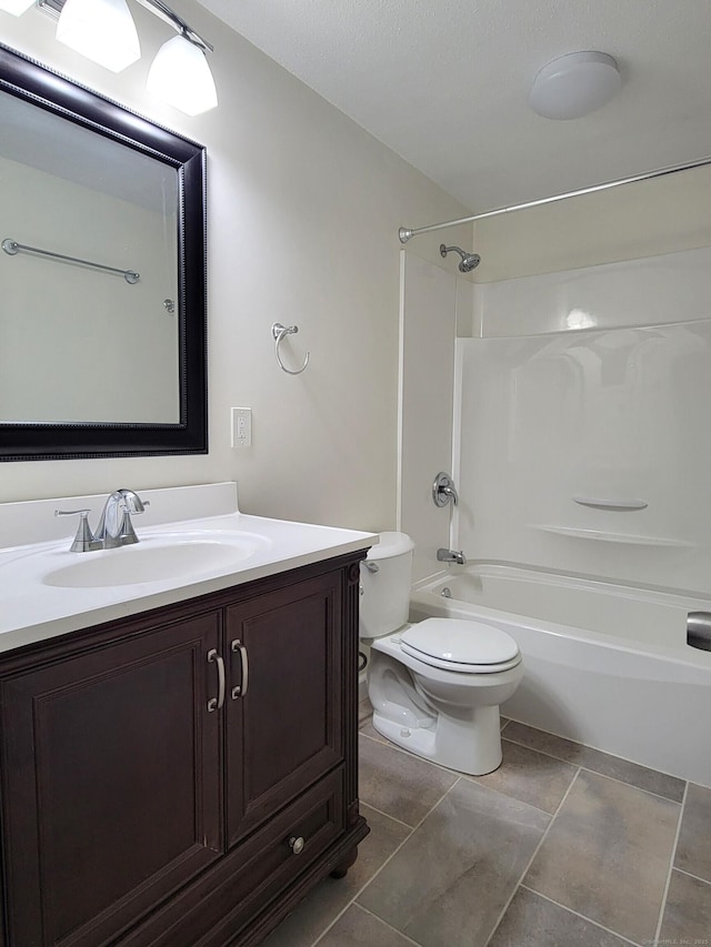 213 Baxter Rd Apt D, Mansfield, CT 06268 - bathroom with tub / shower combination, vanity, toilet, and tile patterned floors