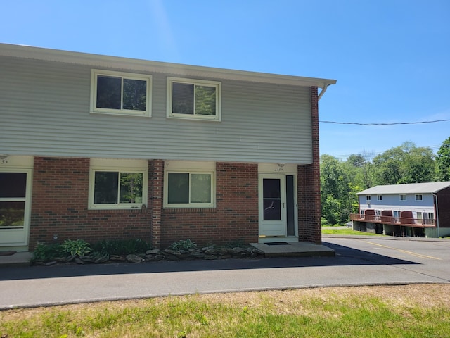 213 Baxter Rd Apt D, Mansfield, CT 06268 - townhome / multi-family property featuring brick siding