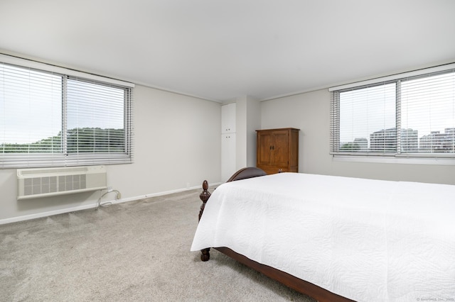 1 Strawberry Hill Ave Apt 7A, Stamford, CT 06902 - bedroom featuring multiple windows, carpet floors, and a wall mounted AC