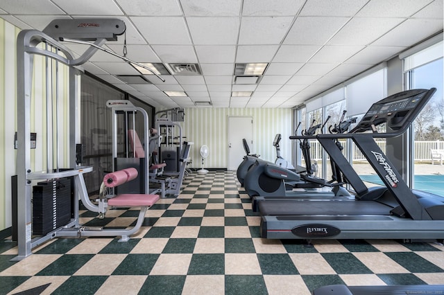 1 Strawberry Hill Ave Apt 7A, Stamford, CT 06902 - workout area featuring tile patterned floors and a paneled ceiling