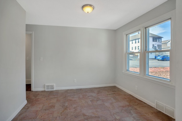 82 Sunnyside Ave, Waterbury, CT 06708 - unfurnished room featuring plenty of natural light and baseboards