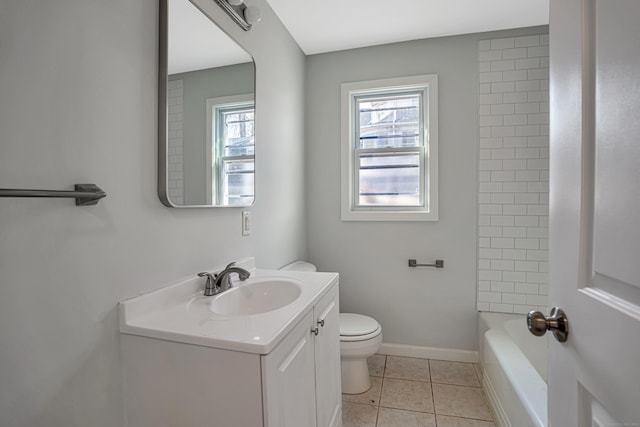 82 Sunnyside Ave, Waterbury, CT 06708 - full bath featuring vanity, toilet, tile patterned flooring, and baseboards