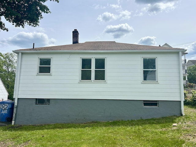 82 Sunnyside Ave, Waterbury, CT 06708 - view of side of property featuring a chimney and a lawn