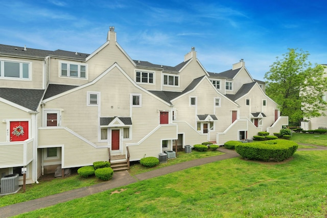173 Russo Ave Unit 406, East Haven, CT 06513 - view of building exterior featuring central AC unit