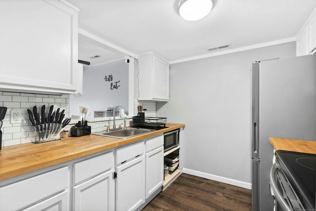 173 Russo Ave Unit 406, East Haven, CT 06513 - kitchen featuring butcher block counters, built in microwave, a sink, backsplash, and dark wood-style floors