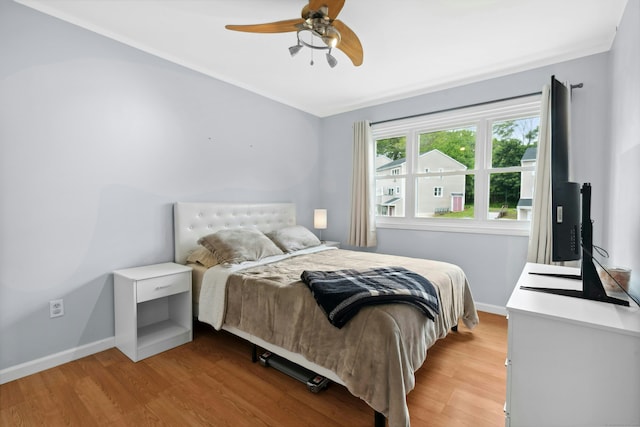 173 Russo Ave Unit 406, East Haven, CT 06513 - bedroom featuring light wood finished floors, baseboards, and ceiling fan