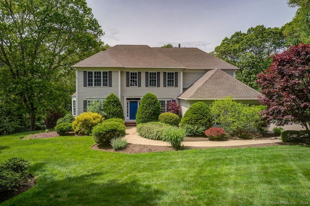 41 Leeward Ln, Groton, CT 06340 - colonial house featuring a front yard and a shingled roof
