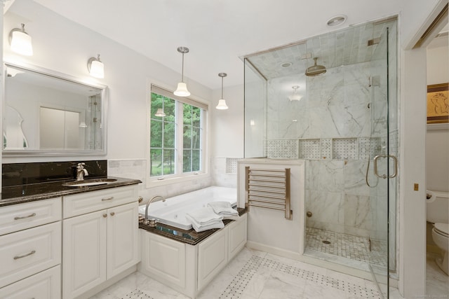 41 Leeward Ln, Groton, CT 06340 - full bathroom with a stall shower, vanity, a bath, toilet, and marble look tiles
