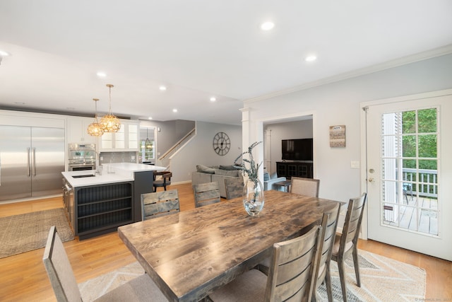 41 Leeward Ln, Groton, CT 06340 - dining space featuring stairway, recessed lighting, light wood-type flooring, decorative columns, and ornamental molding