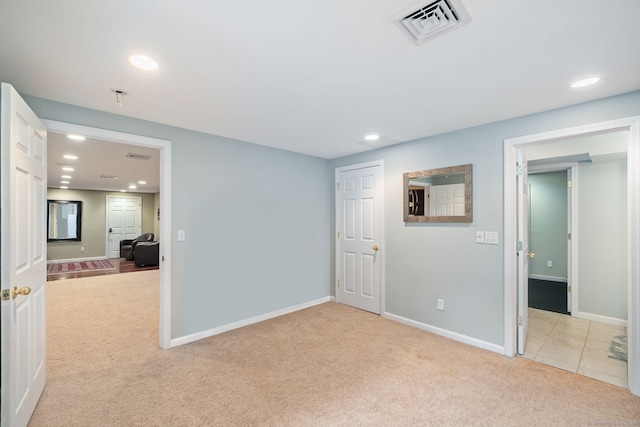 41 Leeward Ln, Groton, CT 06340 - unfurnished bedroom featuring light carpet, recessed lighting, and baseboards