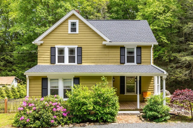 127 Matson Hill Rd, Glastonbury, CT 06073 - view of front of property with a porch, a chimney, and a shingled roof