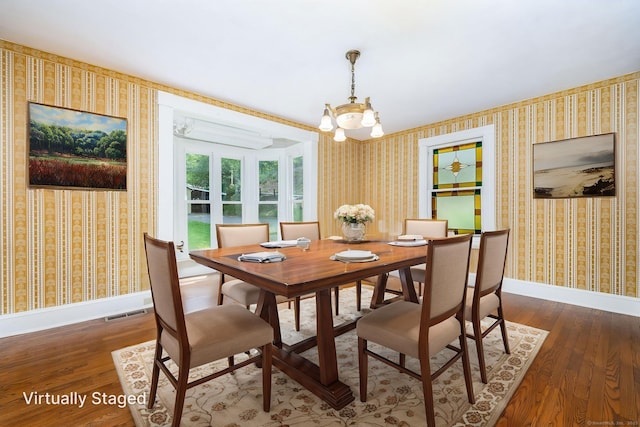 127 Matson Hill Rd, Glastonbury, CT 06073 - dining space featuring wallpapered walls, baseboards, dark wood-style floors, and a chandelier