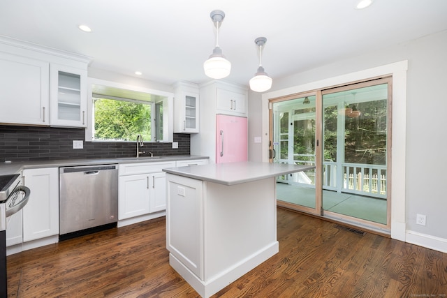 127 Matson Hill Rd, Glastonbury, CT 06073 - kitchen with dishwasher, backsplash, a sink, dark wood-type flooring, and white cabinetry