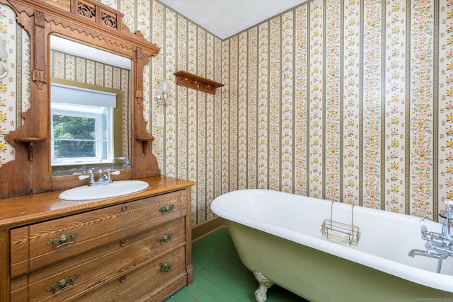 127 Matson Hill Rd, Glastonbury, CT 06073 - bathroom with wallpapered walls, vanity, and a freestanding tub