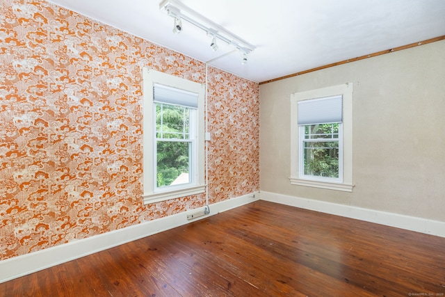 127 Matson Hill Rd, Glastonbury, CT 06073 - empty room with hardwood / wood-style floors, baseboards, plenty of natural light, wallpapered walls, and crown molding