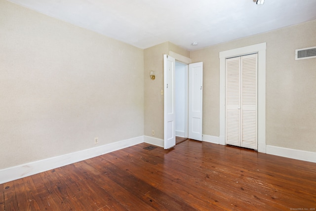 127 Matson Hill Rd, Glastonbury, CT 06073 - unfurnished bedroom with baseboards, wood-type flooring, and a closet