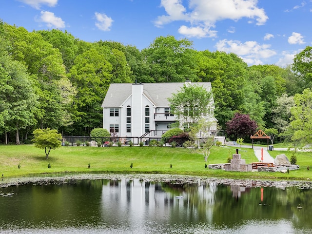 19 Cedarbrook Ln, East Lyme, CT 06333 - rear view of property with an outdoor fire pit, a gazebo, a water view, a forest view, and a yard