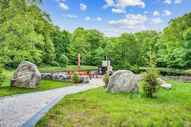 19 Cedarbrook Ln, East Lyme, CT 06333 - view of grassy yard featuring a forest view and a water view