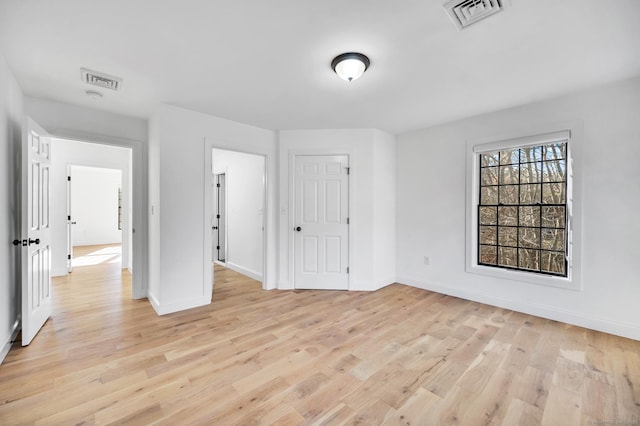 19 Cedarbrook Ln, East Lyme, CT 06333 - unfurnished bedroom featuring baseboards and light wood-type flooring