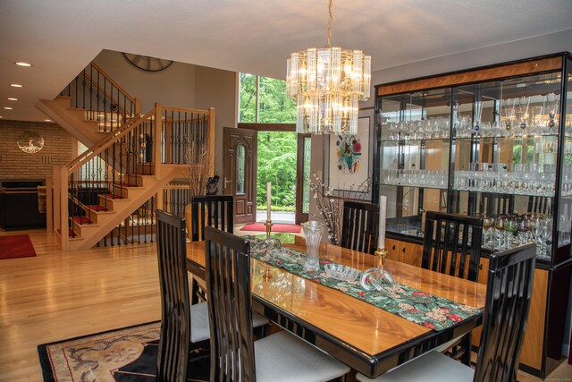 43 Metacomet Rd, Farmington, CT 06032 - dining area featuring stairs, a chandelier, wood finished floors, and recessed lighting