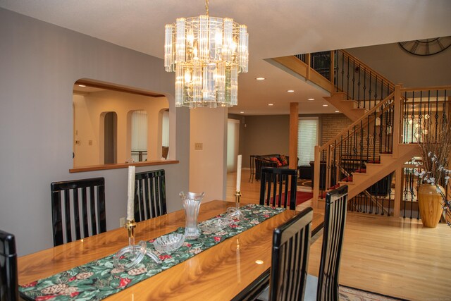 43 Metacomet Rd, Farmington, CT 06032 - dining area with a chandelier, wood finished floors, stairway, and recessed lighting
