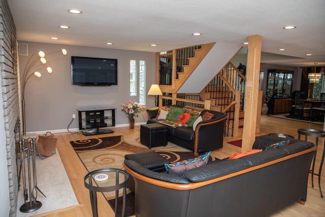 43 Metacomet Rd, Farmington, CT 06032 - living room featuring wood finished floors, stairway, recessed lighting, and baseboards
