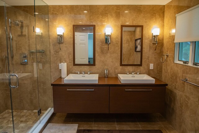 43 Metacomet Rd, Farmington, CT 06032 - full bathroom with double vanity, a shower stall, and tile patterned flooring