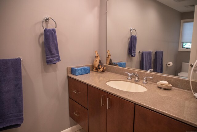 43 Metacomet Rd, Farmington, CT 06032 - bathroom with toilet and vanity