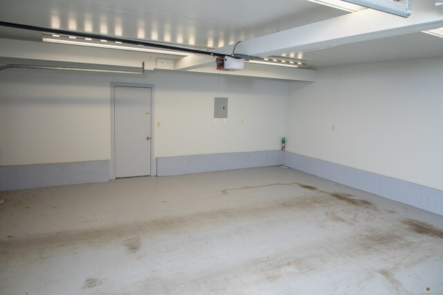 43 Metacomet Rd, Farmington, CT 06032 - garage with a garage door opener and electric panel