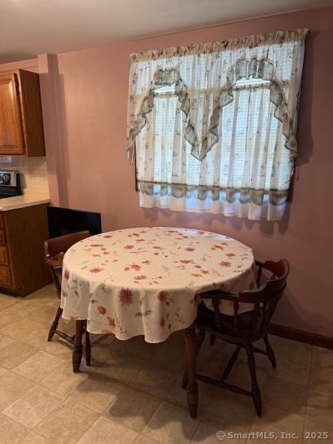 11 Deerfield St, East Haven, CT 06512 - dining area with plenty of natural light