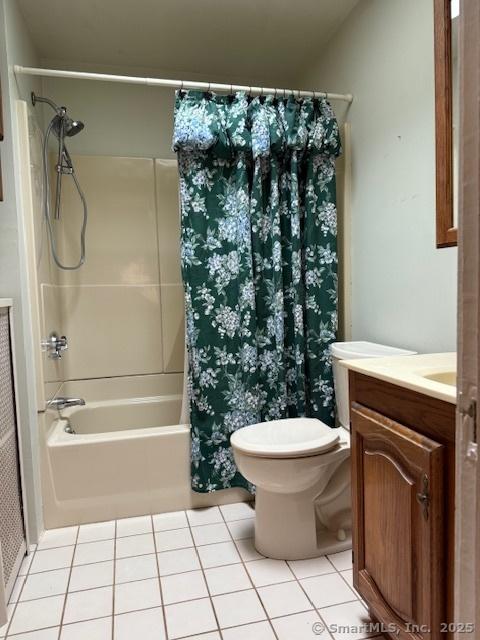 11 Deerfield St, East Haven, CT 06512 - full bathroom featuring vanity, tile patterned flooring, shower / tub combo with curtain, and toilet