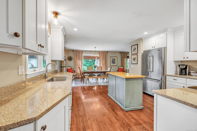 44 Josies Ring Rd, Monroe, CT 06468 - kitchen featuring high quality fridge, butcher block counters, white cabinetry, wood finished floors, and recessed lighting