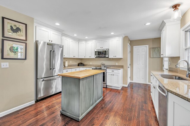 44 Josies Ring Rd, Monroe, CT 06468 - kitchen featuring appliances with stainless steel finishes, wooden counters, white cabinetry, and recessed lighting