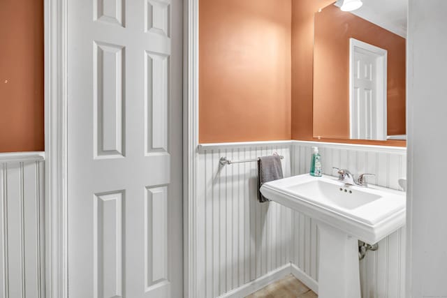 44 Josies Ring Rd, Monroe, CT 06468 - bathroom with a wainscoted wall and a decorative wall