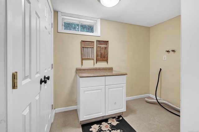 44 Josies Ring Rd, Monroe, CT 06468 - laundry room with baseboards and cabinet space