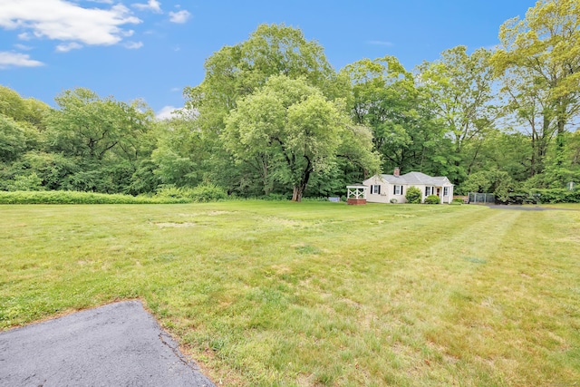 44 Josies Ring Rd, Monroe, CT 06468 - view of grassy yard featuring a wooded view