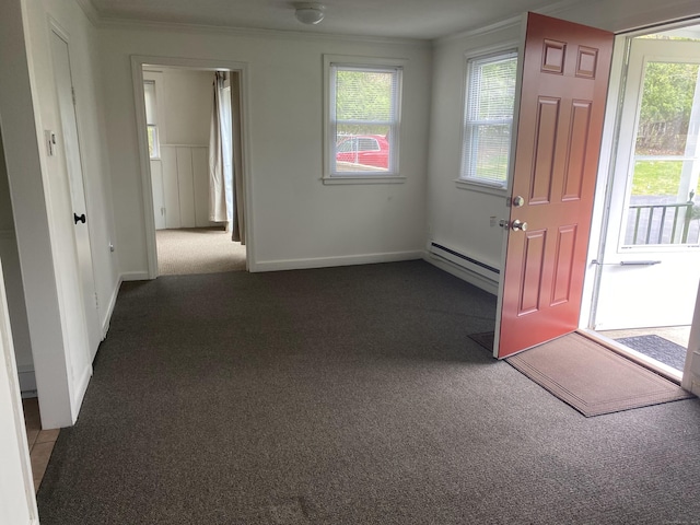44 Josies Ring Rd, Monroe, CT 06468 - entryway with baseboard heating, dark colored carpet, ornamental molding, and plenty of natural light