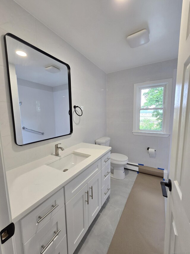 206 Bridgeview Pl, Stratford, CT 06614 - bathroom featuring vanity, toilet, and a baseboard radiator