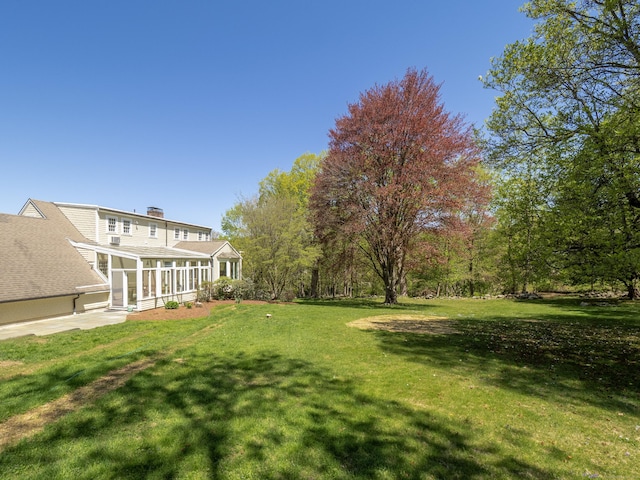 27 Powderhorn Dr, Ridgefield, CT 06877 - view of grassy yard featuring a sunroom