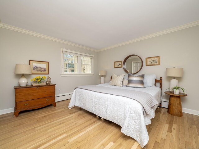 27 Powderhorn Dr, Ridgefield, CT 06877 - bedroom featuring baseboard heating, crown molding, wood finished floors, and baseboards