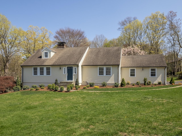 27 Powderhorn Dr, Ridgefield, CT 06877 - cape cod house featuring a chimney, a front lawn, and roof with shingles