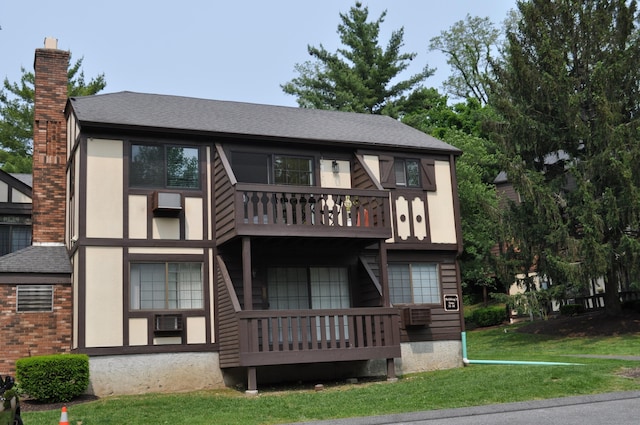 12 Derby Ct Unit 12, Brookfield, CT 06804 - rear view of property with a shingled roof, a lawn, and a chimney
