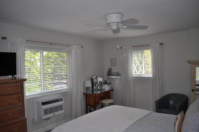 12 Derby Ct Unit 12, Brookfield, CT 06804 - bedroom with an AC wall unit and ceiling fan