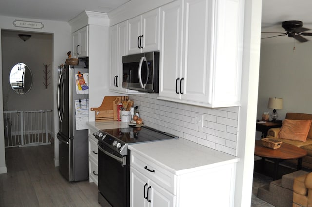 12 Derby Ct Unit 12, Brookfield, CT 06804 - kitchen featuring stainless steel appliances, ceiling fan, tasteful backsplash, and white cabinets