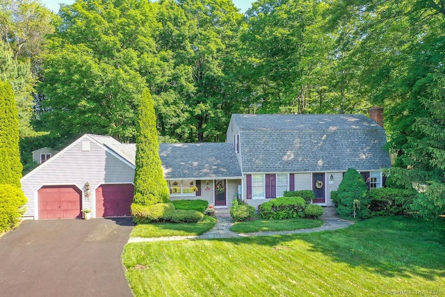 37 Sage Dr, Berlin, CT 06037 - dutch colonial featuring asphalt driveway, a garage, a front lawn, and a chimney